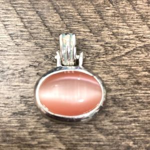 5/$25 Faux Pendant: silver with peachy pink stone.